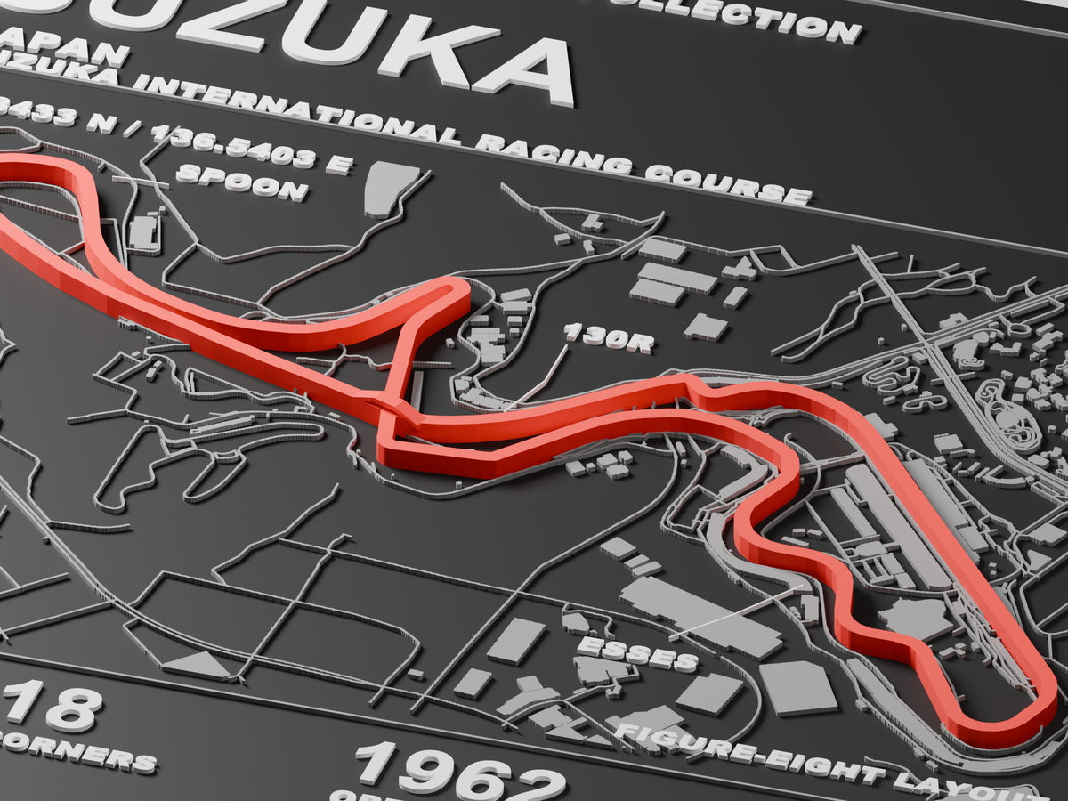 Digital render of the actual Suzuka 3MF model, close-up of raised red track, lettering and map relief; not a photograph of a physical print.